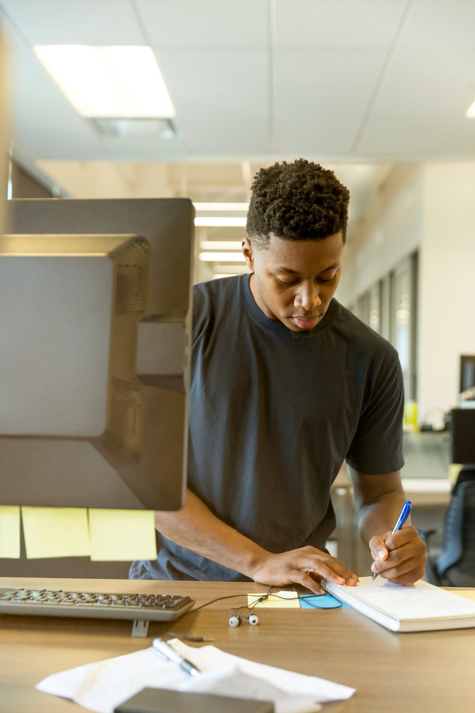 Man writing in journal